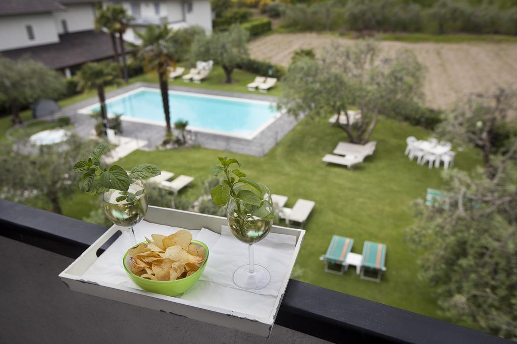 Park Hotel Eden Torbole Sul Garda ภายนอก รูปภาพ